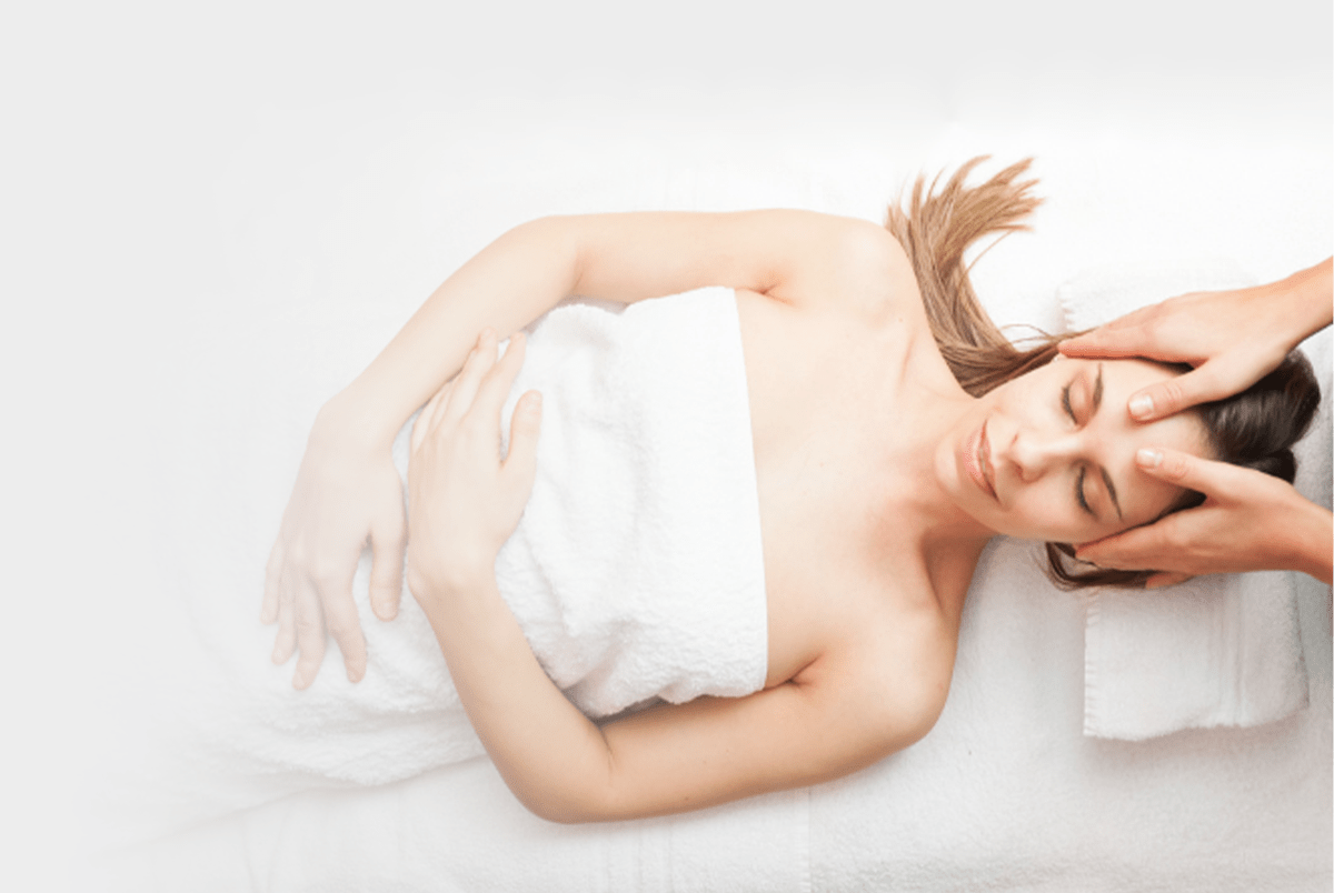 Postnatal massage- A women relaxing being massage